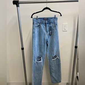 Rebellious high waisted ripped jeans